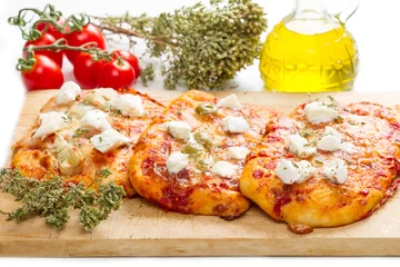 Foto op Plexiglas Pizzeria tris of mixed pizza on wood with ingredients