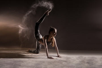 Obraz na płótnie Canvas Girl dancing with a flour