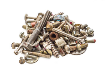 Pile of old screws and nuts on a white background. Pile of old screws and nuts isolated.