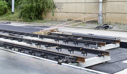 Installing metal rails tram line