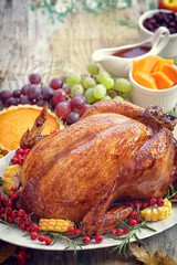 Thanksgiving Turkey dinner on old wooden table with copy space