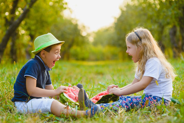 Funny kids taste watermelon. Child Healthy Eating