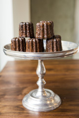 French canelé dessert pastry at a bakery