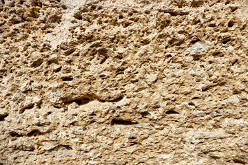Natursteinmauer mit Poren- alt, Hintergrund