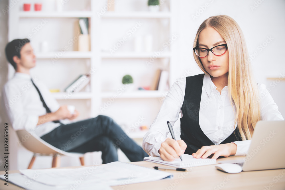 Canvas Prints Young businesswoman working on project