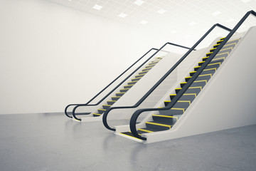 Two escalators and blank wall