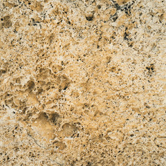 Brown granite texture. Natural rough untreated and unpolished stone wall with grain surface, abstract background
