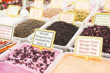 The name of each variety of tea is written on the tablets in four languages: Turkish, English, German and Russian / Turkish national tea and coffee. Göynük, Turkey.