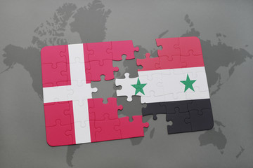 puzzle with the national flag of denmark and syria on a world map background.