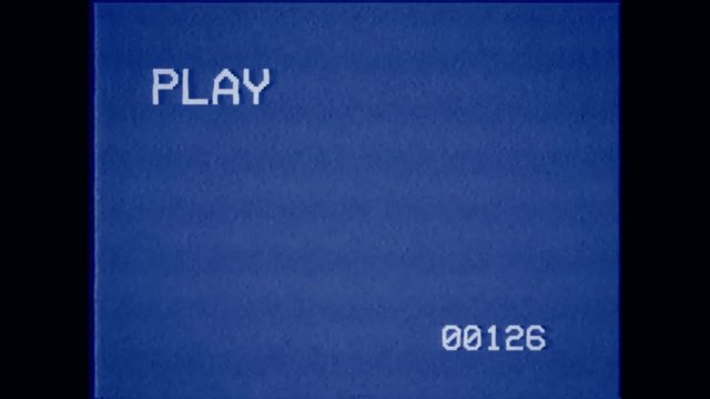 An old bad VHS tape playing. Blue screen with PLAY text and timer. A vintage background for videos, a retro element.
