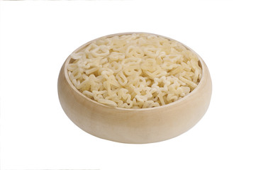 Pasta in a basket, isolated on white background. Ingredients for cooking