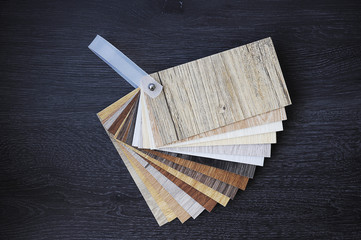 Laminate Wood Concept - Laminated chipboards.Samples of laminate and vinyl floor tile on