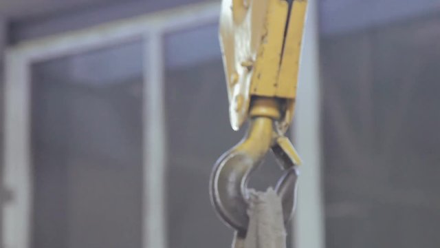 The engine hoist works on the factory