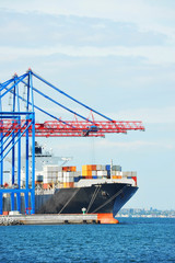 Fototapeta premium Cargo crane and ship