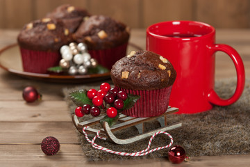 Chocolate Muffins With White Chocolate Chips. Mug Of Tea Or Coff