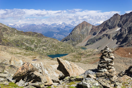 Hiking in Aosta valley, Italy. View of Laures wallon from Laures col. Far away there is Matterhorn.
