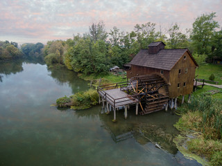 Historical watermill on Small Danube near the village Jelka, Slovakia at dusk