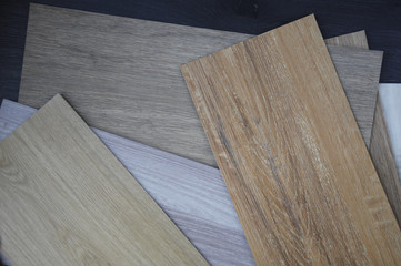 wood texture floor Samples of laminate and vinyl veneer on woode
