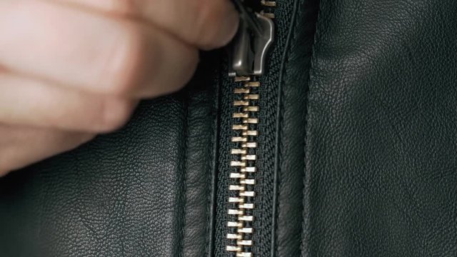 close up Opened zipper on man leather jacket