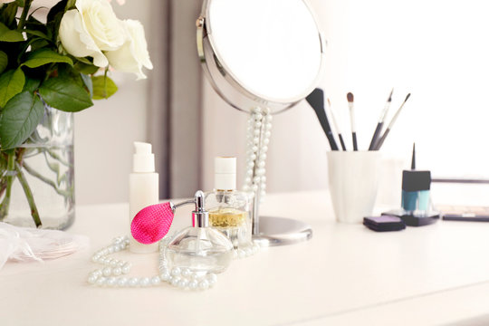 Perfume on light dressing table