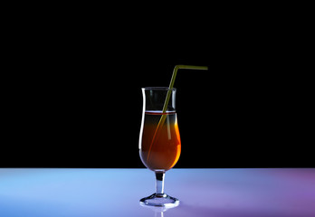 Tasty long drink on light table