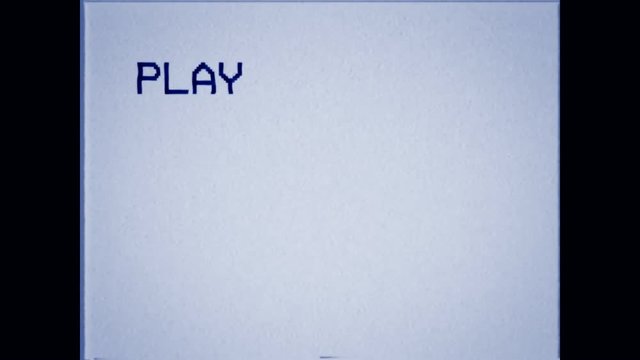 An old bad VHS tape playing. White screen with PLAY text only. A vintage background for videos, a retro element.
