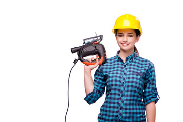 Young woman in industrial concept isolated on white