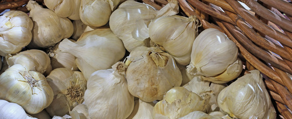 Background of cloves of garlic for sale at the greengroce