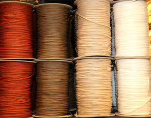 skeins of colored threads of wool and cotton