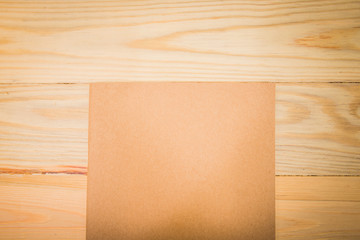 Close note book on wooden background
