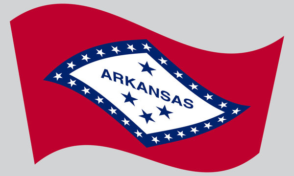 Flag of Arkansas waving on gray background