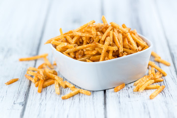 Bowl with Potato Sticks (close-up shot)