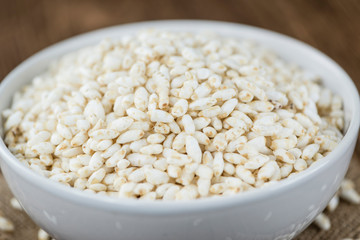 Old wooden table with puffed Rice