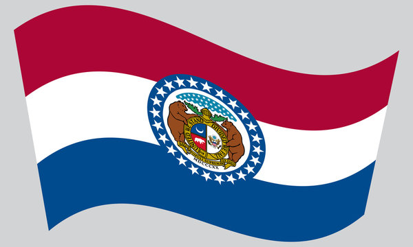Flag of Missouri waving on gray background