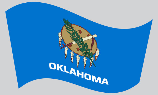 Flag of Oklahoma waving on gray background
