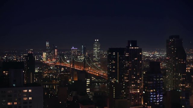  New York City by night overlooking the Queensborough bridge 