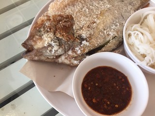 Tilapia grilled on white dish