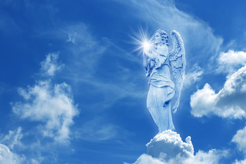 Beautiful angel in heaven with divine rays of light
