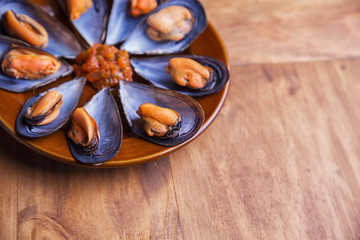 Plate of mussels with sauce