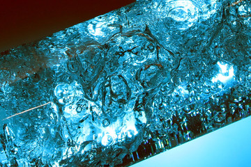 close up of drinking water / Water is a polar inorganic compound that is at room temperature a tasteless and odorless liquid, nearly colorless with a hint of blue.