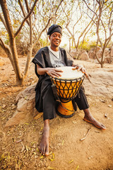 african drummer playing
