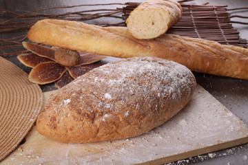 wheat bread isolated on wooden background