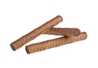 Wafer roll with chocolate and cocoa coating on a white backgroun