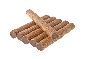 Wafer roll with chocolate and cocoa coating on a white backgroun