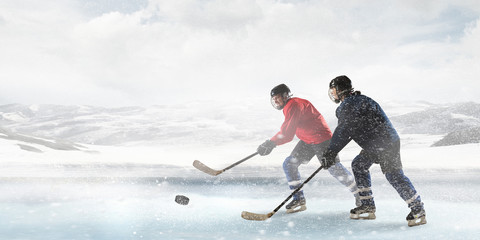 Hockey players on the ice . Mixed media