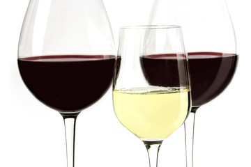Macro photo of red and white wine glasses
