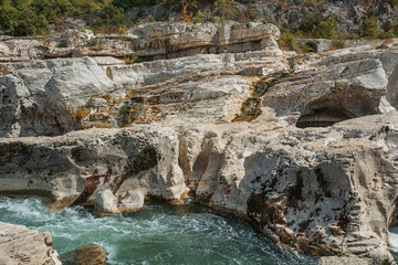 Spectacular waterfalls and rapids of the Cascades du Sautadet, France.