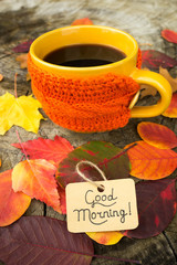 Fototapeta na wymiar Cup of black coffee and Good morning note