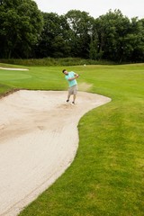 Man playing golf