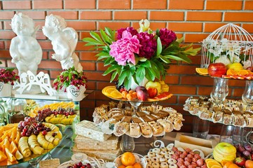 statues of angels at the wedding reception